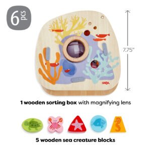 Underwater World Wooden Shape Sorter has 6 pieces including 1 wooden sorting box with magnifying lens and 5 wooden sea creature blocks