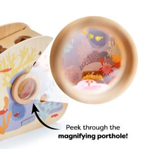 Wooden toy with underwater-themed illustrations and a magnified underwater scene showing sea creatures. Text reads 